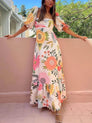 Ivy | Robe longue à col carré et imprimé floral pour les fêtes
