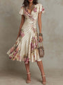 Margaret | Robe mi-longue en satin à motif floral vintage