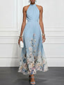 Rosalyn | Robe longue dos nu en mousseline à fleurs bleues