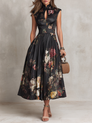 Patricia | Robe mi-longue plissée en satin à fleurs noire